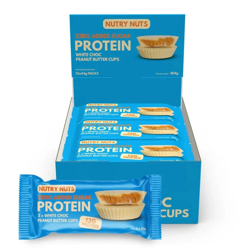 Nutry Nuts Zero Added Sugar - Cups au beurre de cacahuète protéinés 12 x 42 g / Chocolat blanc & cacahuètes - Barres protéinées Nutry Nuts - Boutique en ligne de fitness