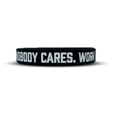 Buy the Elite Athletic Gear "NOBODY CARES. WORK HARDER." Wristband XL (9") at HighPowered.ch